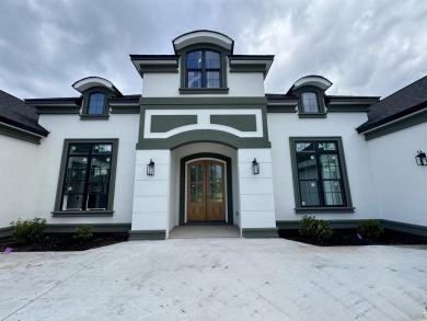 Welcome to 1261 Wood Stork Dr., a stunning new construction on Wild Wing Plantation in South Carolina - for sale on GolfHomes.com, golf home, golf lot