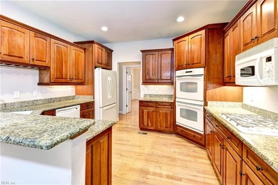 This classic brick Colonial offers enduring appeal paired with a on Fords Colony Country Club in Virginia - for sale on GolfHomes.com, golf home, golf lot