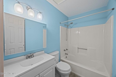 Welcome to this charming 3-bedroom, 2-bathroom home offering 1 on Harbour Point Golf Club in North Carolina - for sale on GolfHomes.com, golf home, golf lot