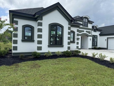 Welcome to 1261 Wood Stork Dr., a stunning new construction on Wild Wing Plantation in South Carolina - for sale on GolfHomes.com, golf home, golf lot