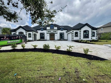 Welcome to 1261 Wood Stork Dr., a stunning new construction on Wild Wing Plantation in South Carolina - for sale on GolfHomes.com, golf home, golf lot