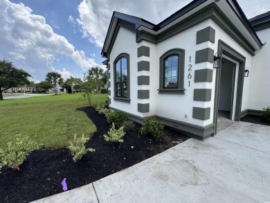 Welcome to 1261 Wood Stork Dr., a stunning new construction on Wild Wing Plantation in South Carolina - for sale on GolfHomes.com, golf home, golf lot
