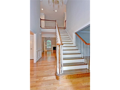 This classic brick Colonial offers enduring appeal paired with a on Fords Colony Country Club in Virginia - for sale on GolfHomes.com, golf home, golf lot