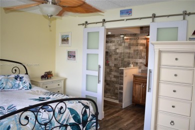 If when you think FLORIDA, you think surf, ocean, sand and the on Sunrise Lakes Phase III in Florida - for sale on GolfHomes.com, golf home, golf lot