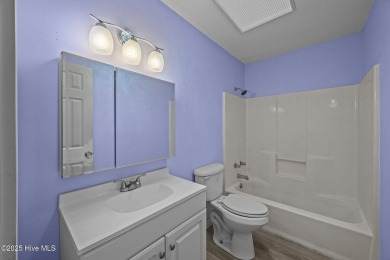 Welcome to this charming 3-bedroom, 2-bathroom home offering 1 on Harbour Point Golf Club in North Carolina - for sale on GolfHomes.com, golf home, golf lot