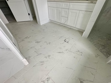 Welcome to 1261 Wood Stork Dr., a stunning new construction on Wild Wing Plantation in South Carolina - for sale on GolfHomes.com, golf home, golf lot