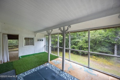 Welcome to this charming 3-bedroom, 2-bathroom home offering 1 on Harbour Point Golf Club in North Carolina - for sale on GolfHomes.com, golf home, golf lot