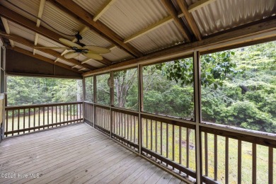 Welcome to this charming 3-bedroom, 2-bathroom home offering 1 on Harbour Point Golf Club in North Carolina - for sale on GolfHomes.com, golf home, golf lot