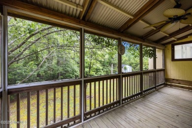Welcome to this charming 3-bedroom, 2-bathroom home offering 1 on Harbour Point Golf Club in North Carolina - for sale on GolfHomes.com, golf home, golf lot