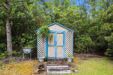 Welcome to this charming 3-bedroom, 2-bathroom home offering 1 on Harbour Point Golf Club in North Carolina - for sale on GolfHomes.com, golf home, golf lot