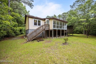 Welcome to this charming 3-bedroom, 2-bathroom home offering 1 on Harbour Point Golf Club in North Carolina - for sale on GolfHomes.com, golf home, golf lot