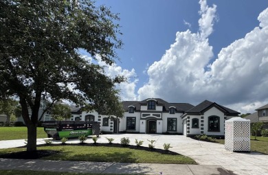 Welcome to 1261 Wood Stork Dr., a stunning new construction on Wild Wing Plantation in South Carolina - for sale on GolfHomes.com, golf home, golf lot