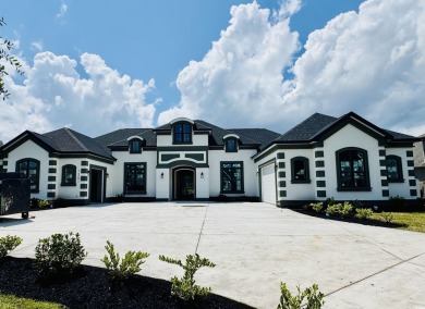 Welcome to 1261 Wood Stork Dr., a stunning new construction on Wild Wing Plantation in South Carolina - for sale on GolfHomes.com, golf home, golf lot