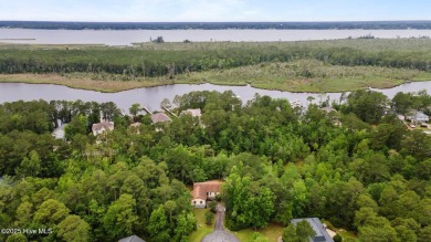 Welcome to this charming 3-bedroom, 2-bathroom home offering 1 on Harbour Point Golf Club in North Carolina - for sale on GolfHomes.com, golf home, golf lot