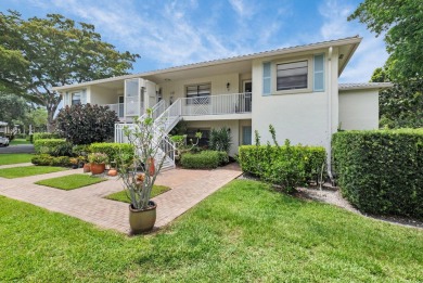 Enjoy serene water views from this light and bright first-floor on Hunters Run Golf and Country Club in Florida - for sale on GolfHomes.com, golf home, golf lot
