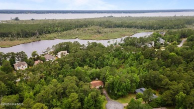 Welcome to this charming 3-bedroom, 2-bathroom home offering 1 on Harbour Point Golf Club in North Carolina - for sale on GolfHomes.com, golf home, golf lot