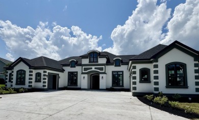 Welcome to 1261 Wood Stork Dr., a stunning new construction on Wild Wing Plantation in South Carolina - for sale on GolfHomes.com, golf home, golf lot