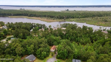 Welcome to this charming 3-bedroom, 2-bathroom home offering 1 on Harbour Point Golf Club in North Carolina - for sale on GolfHomes.com, golf home, golf lot