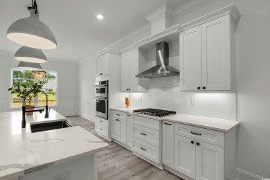 Welcome to 1261 Wood Stork Dr., a stunning new construction on Wild Wing Plantation in South Carolina - for sale on GolfHomes.com, golf home, golf lot