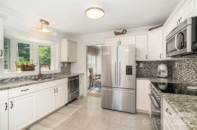 This storybook home offers character, charm, and a backyard on Rock Hill Country Club in South Carolina - for sale on GolfHomes.com, golf home, golf lot