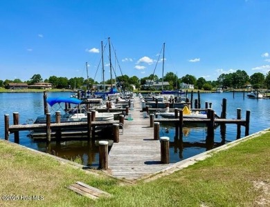 Welcome to this charming 3-bedroom, 2-bathroom home offering 1 on Harbour Point Golf Club in North Carolina - for sale on GolfHomes.com, golf home, golf lot
