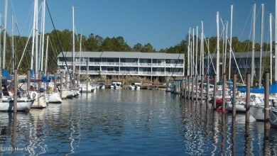 Welcome to this charming 3-bedroom, 2-bathroom home offering 1 on Harbour Point Golf Club in North Carolina - for sale on GolfHomes.com, golf home, golf lot