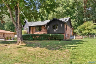 Don't miss this beautifully updated Mid-Century Modern gem just on Valley Hill Country Club in Alabama - for sale on GolfHomes.com, golf home, golf lot