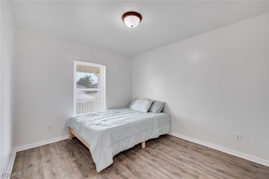 Beautifully updated 3-bedroom plus den, 2-bath home in SW Cape on Palmetto-Pine Country Club in Florida - for sale on GolfHomes.com, golf home, golf lot