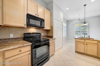 Nestled along the 9th fairway of a picturesque golf course, this on Baytree National Golf Links in Florida - for sale on GolfHomes.com, golf home, golf lot