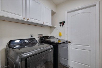 Beautifully updated 3-bedroom plus den, 2-bath home in SW Cape on Palmetto-Pine Country Club in Florida - for sale on GolfHomes.com, golf home, golf lot