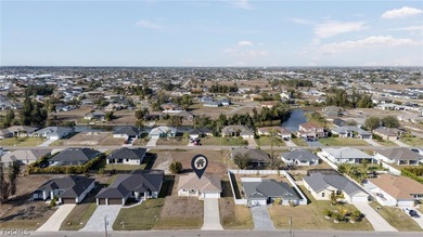 Beautifully updated 3-bedroom plus den, 2-bath home in SW Cape on Palmetto-Pine Country Club in Florida - for sale on GolfHomes.com, golf home, golf lot