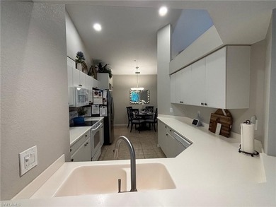 Priced below market value. Lovely unfurnished second floor unit on  in Florida - for sale on GolfHomes.com, golf home, golf lot