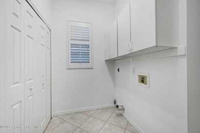 Nestled along the 9th fairway of a picturesque golf course, this on Baytree National Golf Links in Florida - for sale on GolfHomes.com, golf home, golf lot