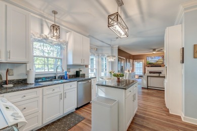 Situated alongside the lush fairways of the desirable Charleston on Charleston National Golf Club in South Carolina - for sale on GolfHomes.com, golf home, golf lot