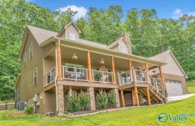 Stunning 3-bed/2-bath home offering privacy on 6.20 acres on Scottsboro Golf and Country Club in Alabama - for sale on GolfHomes.com, golf home, golf lot