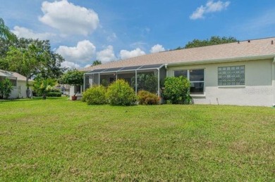 This gorgeous home has it all!  Check out the curb appeal of the on Falcon Watch Golf Club in Florida - for sale on GolfHomes.com, golf home, golf lot