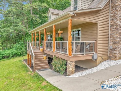 Stunning 3-bed/2-bath home offering privacy on 6.20 acres on Scottsboro Golf and Country Club in Alabama - for sale on GolfHomes.com, golf home, golf lot