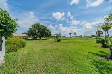 This gorgeous home has it all!  Check out the curb appeal of the on Falcon Watch Golf Club in Florida - for sale on GolfHomes.com, golf home, golf lot