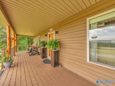 Stunning 3-bed/2-bath home offering privacy on 6.20 acres on Scottsboro Golf and Country Club in Alabama - for sale on GolfHomes.com, golf home, golf lot