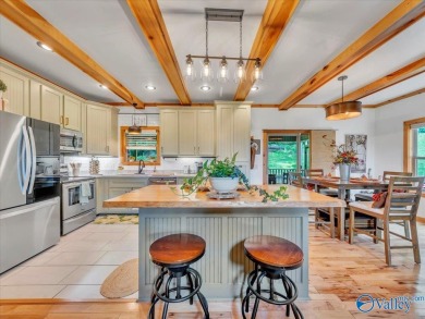 Stunning 3-bed/2-bath home offering privacy on 6.20 acres on Scottsboro Golf and Country Club in Alabama - for sale on GolfHomes.com, golf home, golf lot