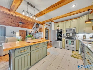 Stunning 3-bed/2-bath home offering privacy on 6.20 acres on Scottsboro Golf and Country Club in Alabama - for sale on GolfHomes.com, golf home, golf lot