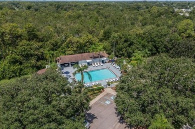 This gorgeous home has it all!  Check out the curb appeal of the on Falcon Watch Golf Club in Florida - for sale on GolfHomes.com, golf home, golf lot