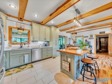 Stunning 3-bed/2-bath home offering privacy on 6.20 acres on Scottsboro Golf and Country Club in Alabama - for sale on GolfHomes.com, golf home, golf lot