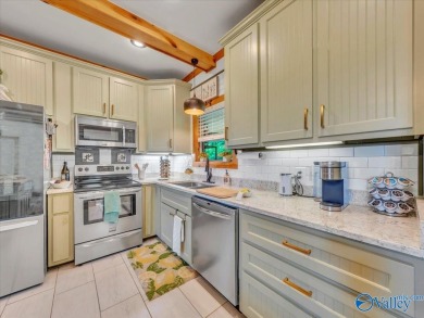 Stunning 3-bed/2-bath home offering privacy on 6.20 acres on Scottsboro Golf and Country Club in Alabama - for sale on GolfHomes.com, golf home, golf lot