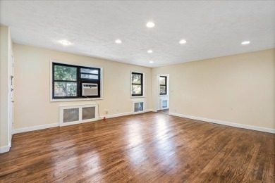 Discover comfort and convenience in this move-in-ready on Clearview Park Golf Course in New York - for sale on GolfHomes.com, golf home, golf lot