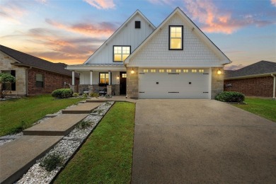 Welcome to a beautifully crafted residence where timeless design on The Lake Country Club - Lake Waco in Texas - for sale on GolfHomes.com, golf home, golf lot