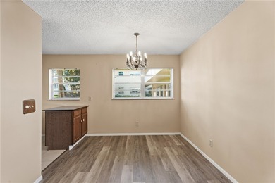 Desirable first floor 2-bedroom, 2-bath in an active 55+ on The American Golf Club in Florida - for sale on GolfHomes.com, golf home, golf lot