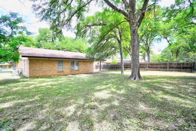 Presenting an impeccably maintained brick home that has recently on Scott Schriener Municipal Golf Course in Texas - for sale on GolfHomes.com, golf home, golf lot