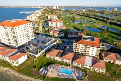 Live a luxurious lifestyle in this spacious, beautifully updated on Isla Del Sol Yacht and Country Club in Florida - for sale on GolfHomes.com, golf home, golf lot