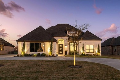 NEW IN THE RESORT AT EAGLE MOUNTAIN LAKE Situated on a premium on The Golf Club at Resort Eagle Mountain Lake in Texas - for sale on GolfHomes.com, golf home, golf lot